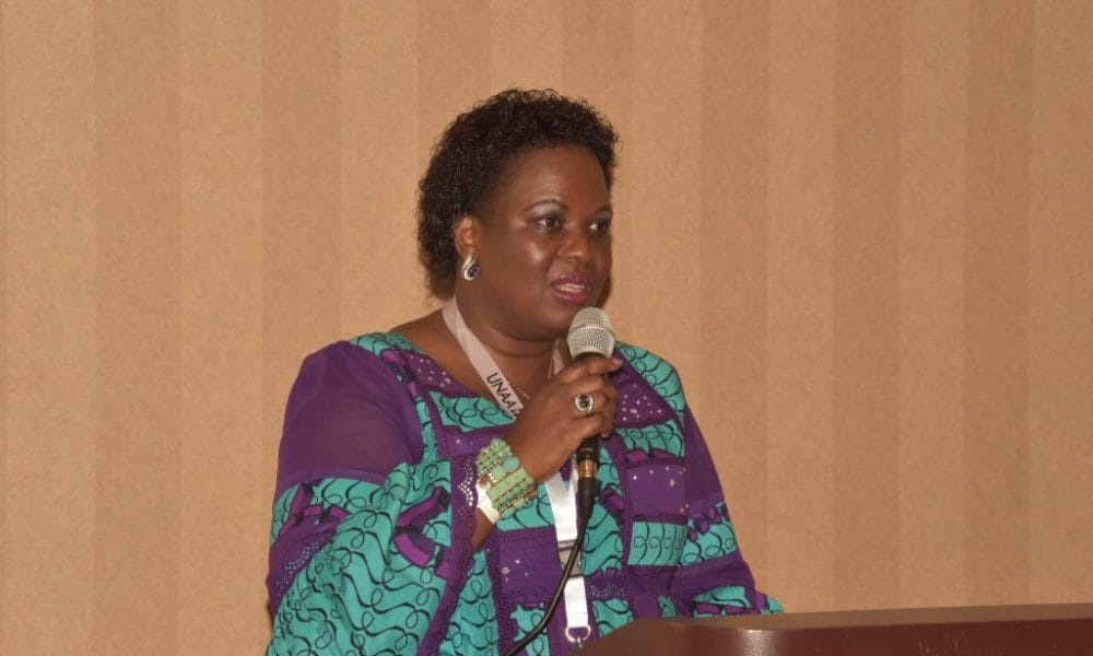 The Minister of Lands Amongi Betty making a presentation on Lands at the UNAA Conventioni in Miami Florida