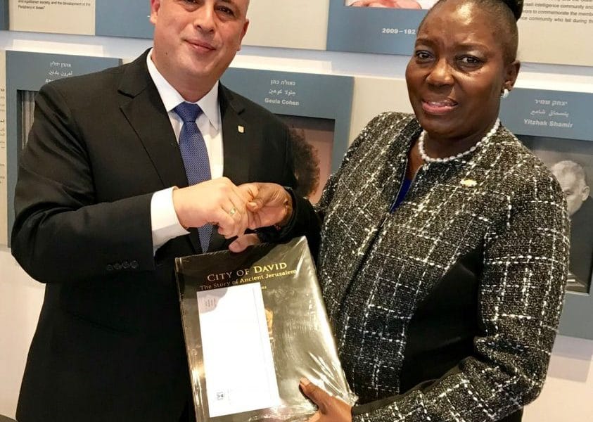 The Deputy Speaker of the Knesset Hon. Yehiel Hilik Bar hands a gift to the Speaker Rebecca Kadaga at the African Speakers seminar in Jerusalem 1 3